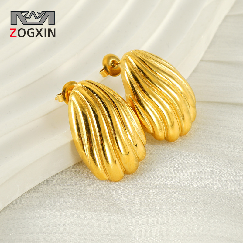 Pendientes de acero de titanio chapado en oro de acero inoxidable dorado de 18k estilo europeo y americano Pendientes de rayas con patrón de concha retorcida Pendientes mujeres