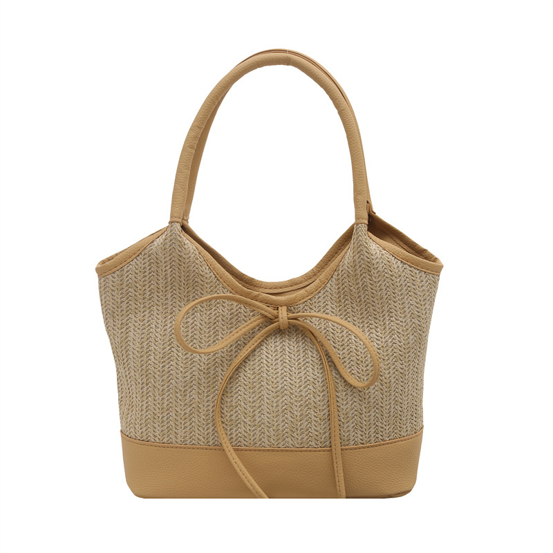 Verano 2025 bowknot axila bolso femenino moda casual bolso de mano de gran capacidad bolso de hombro de color de contraste de paja de nicho