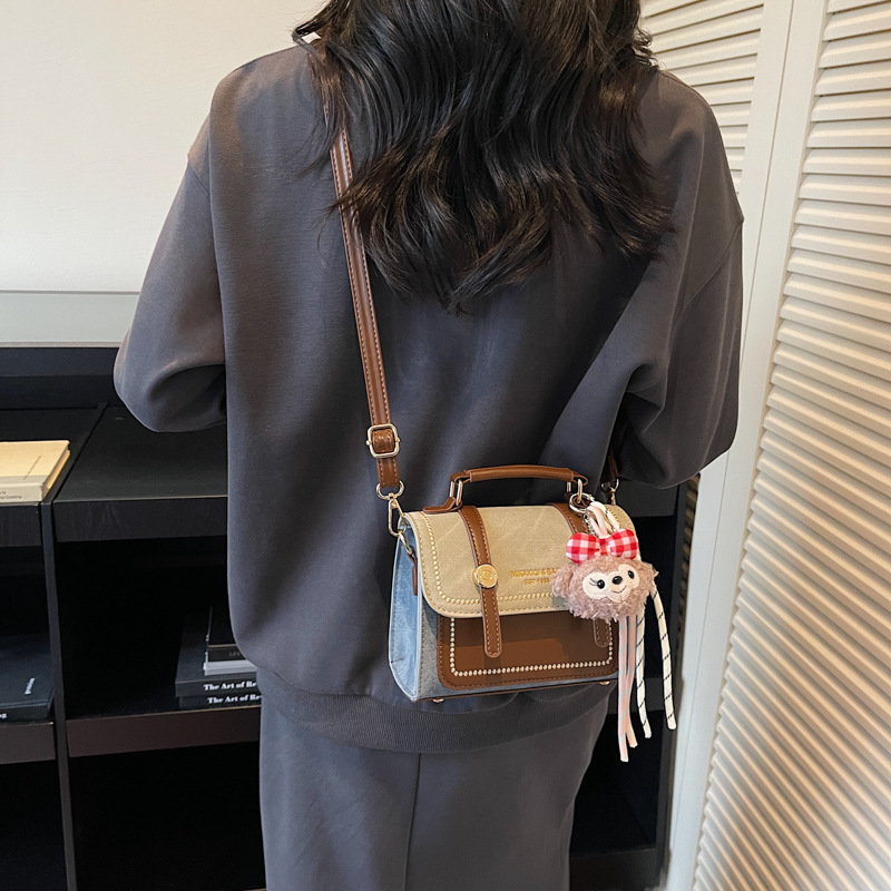 Bolso de mano doble estilo inglés de estilo extranjero 2025, otoño y invierno nuevo estilo de bolso de mujer relajado, bolso de hombro casual.