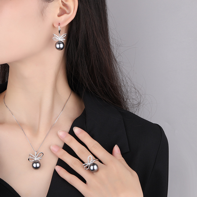 Zhuang Sheng joyería cobre inferior chapado en oro nuevo gris con incrustaciones rebordear moda arco diamante traje femenino 14mm