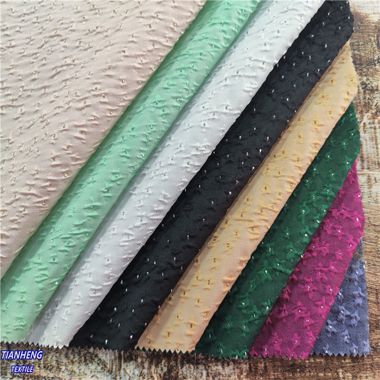 浮雕金丝织锦星星花  时装舞台表演服饰DIY箱包鞋材提花布料直供