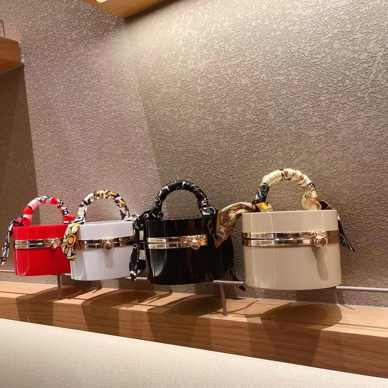 The 2025 new style women's bag is a trendy and fashionable candy-colored acrylic bag, a hand-held silk scarf, a lockable dinner bag, and a box bag details Picture