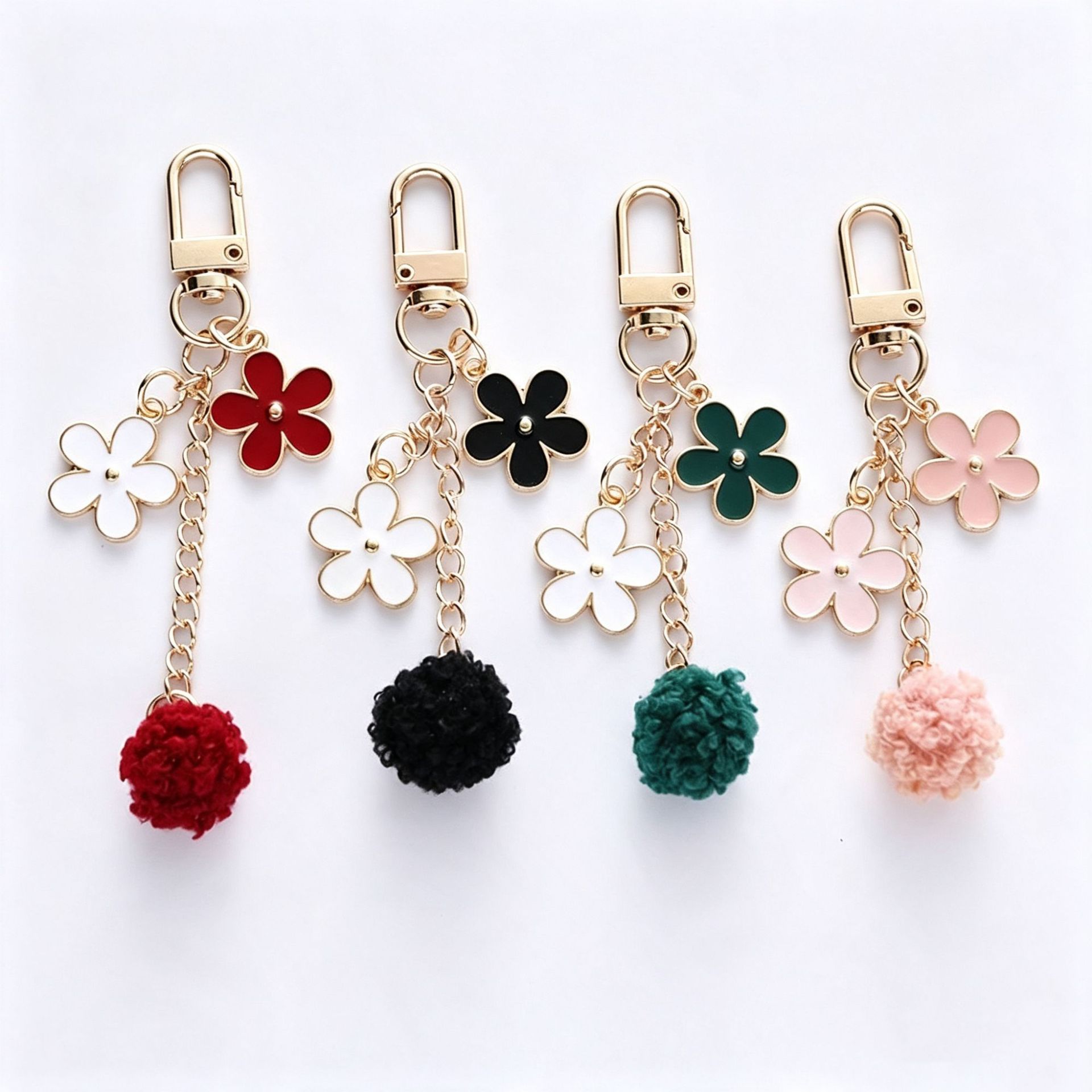 Cute girly style pom-pom flower keychain pendant, sweet and unique oil-drip car key and bag decoration, wholesale
