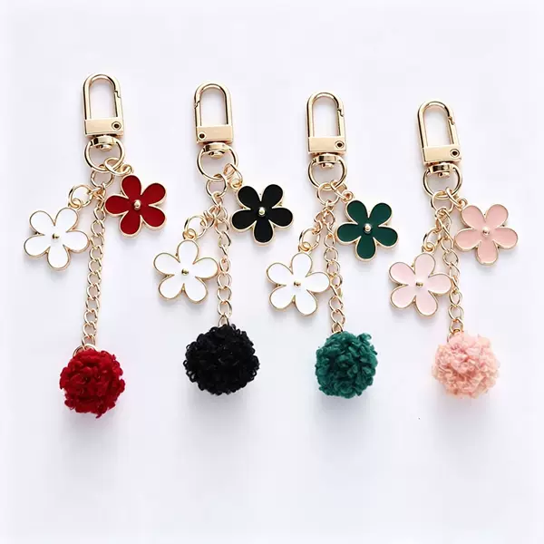 Cute girly style pom-pom flower keychain pendant, sweet and unique oil-drip car key and bag decoration, wholesale