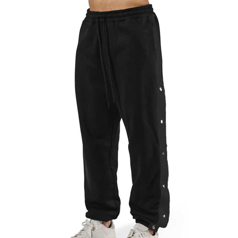 Los deportes de otoño e invierno de los músculos locos están completamente abiertos con hebillas y pantalones de terciopelo. los hombres están relajados y relajados. los pies están atados en otoño e invierno y los pantalones deportivos de terciopelo.