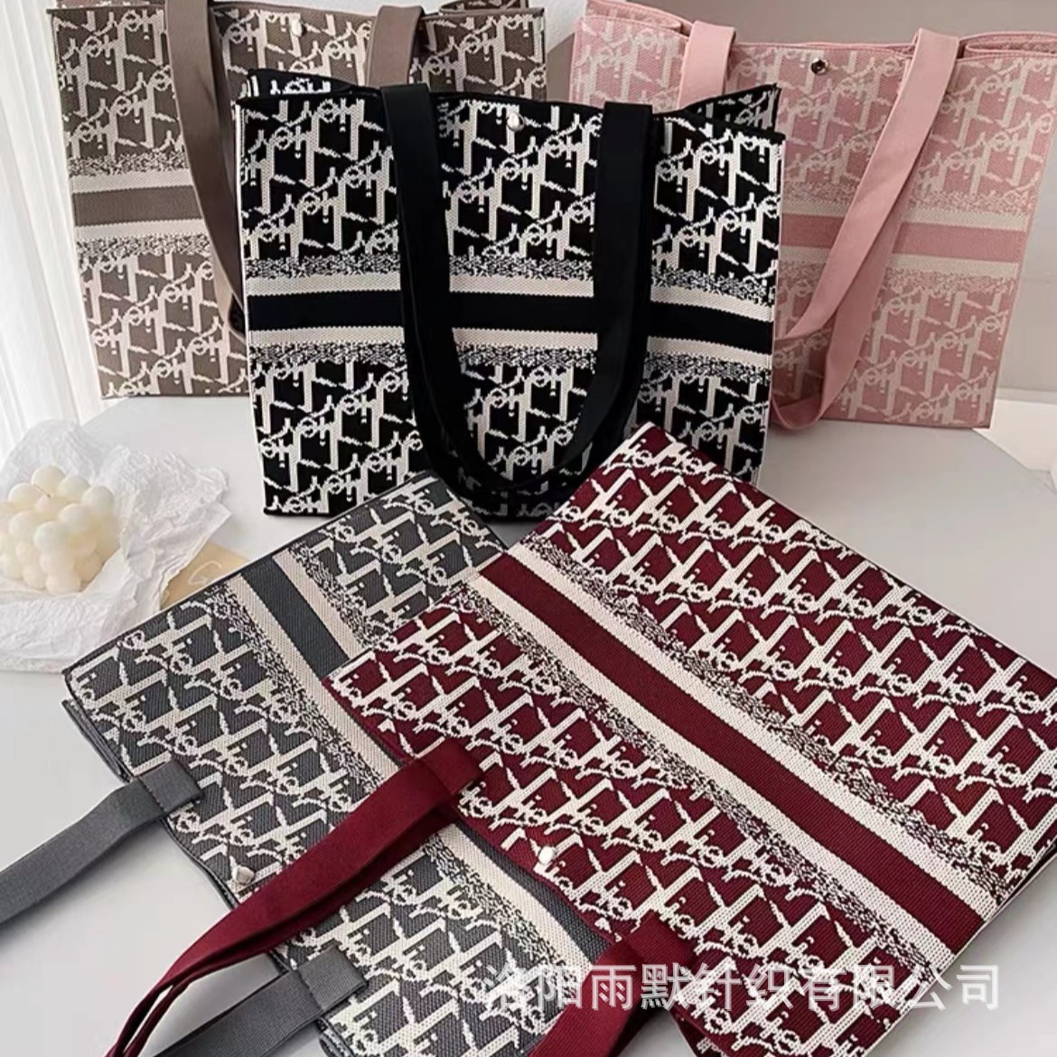 2025 bolso de hombro de pata de gallo rosa de alta calidad popular para mujer nuevo bolso portátil de punto de gran capacidad de moda