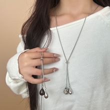 虎眼石水滴抽拉项链女2025新款轻奢小众设计感配饰秋冬长款毛衣链
