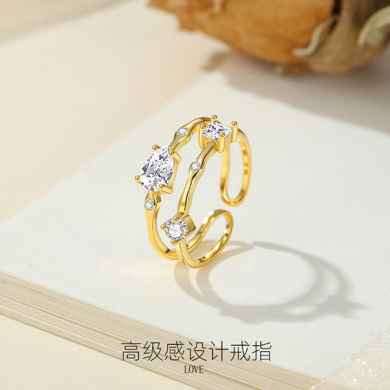 925 plata versión coreana del anillo femenino diseño de nicho gota de agua viento simple luz lujo doble línea de anillo fabricante más vendido