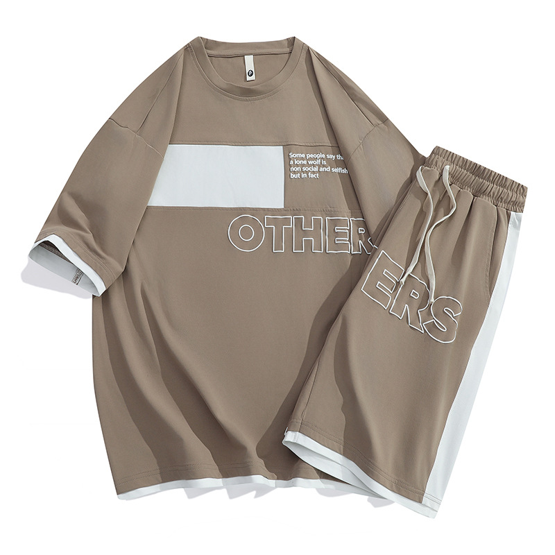 Tren de verano Traje deportivo casual suelto para hombre Camiseta de manga corta Traje de dos piezas para jóvenes estadounidenses