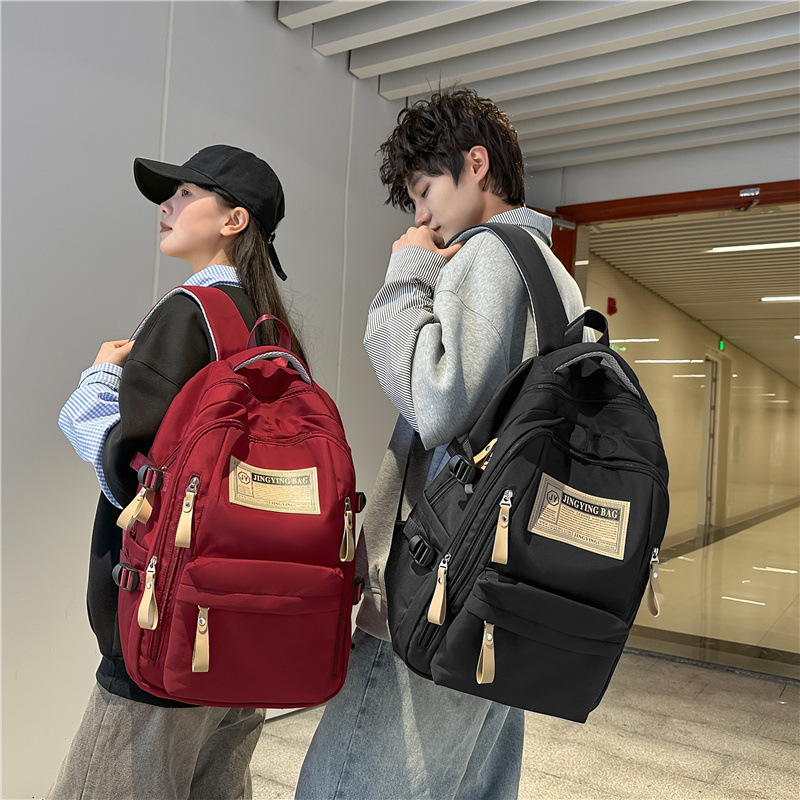Nueva mochila escolar de estudiantes de secundaria y secundaria de nylon de moda universal mochila casual para hombres y mujeres para viajar mochila de computadora