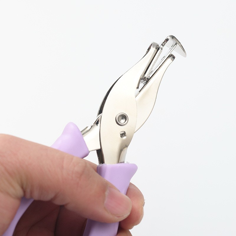 Macaron color Oficina Finanzas Extractor de uñas de mano al por mayor conveniente grapadora Extractor de uñas de mano de ahorro de mano de trabajo Extractor de uñas