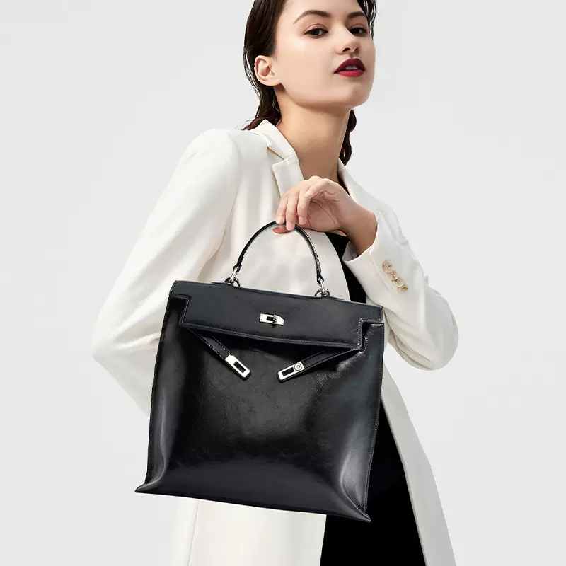 定制秋冬韩版小众通勤手提背包 真皮大容量女士时尚高级感双肩包