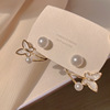 Small design earrings from pearl with bow, 2022 collection, trend of season