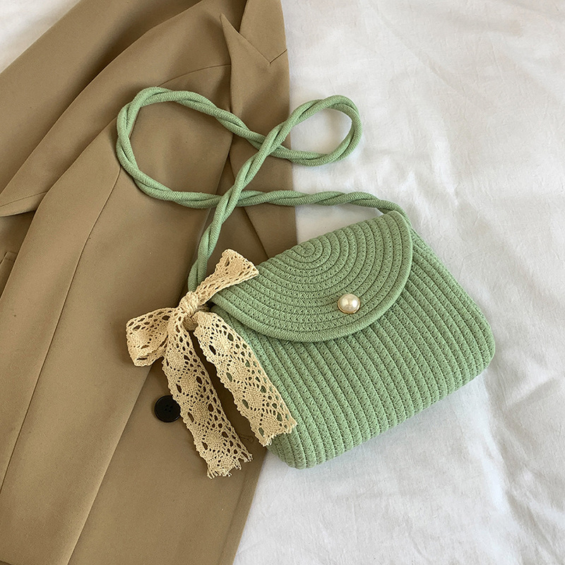 Bolso de tejido para mujeres 2024 nuevo verano cordón trenzado mochila de hombro bolso de hombro pequeño arco encantador