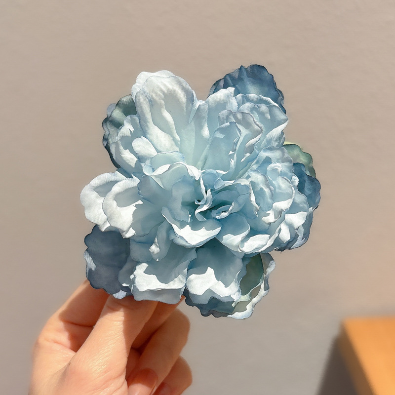 Super Fairy Flower Horquilla Lado femenino 2025 Nuevo estilo Atmósfera Clip de pico de pato con flequillo para niños Tombro de horquilla de sentido avanzado