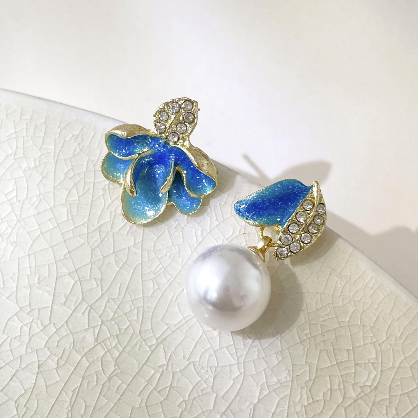 Pendientes al por mayor transfronterizos puestos del mercado nocturno Pendientes de origen empresarial Pendientes de borla de temperamento de todo fósforo público Pendientes coreanos