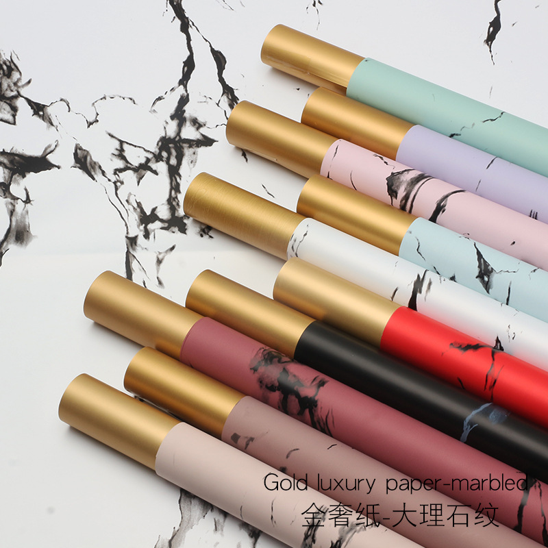 Huaxi comercio exterior transfronterizo mayorista oro lujo papel impermeable mármol oro papel de flor florista papel de embalaje