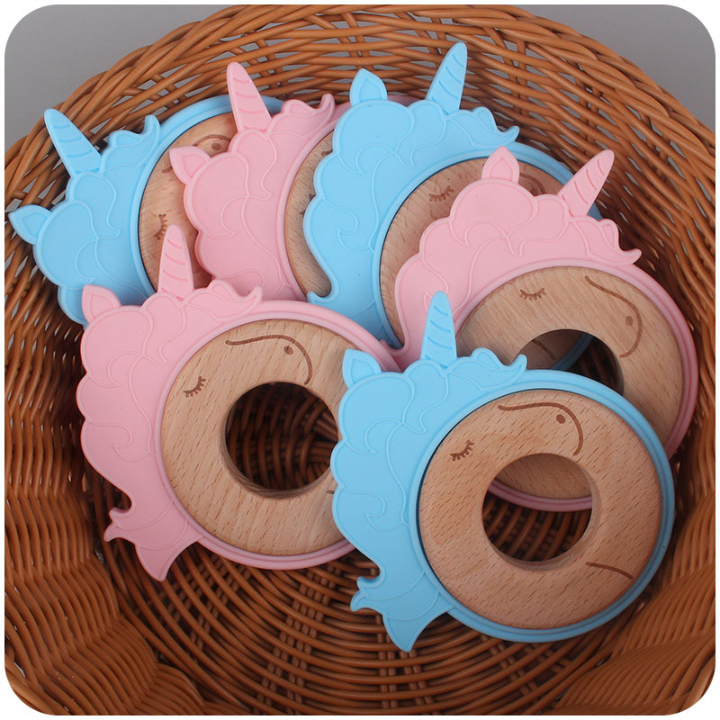Nuevo bebé suministros de dibujos animados animal unicornio anillo de madera mordedura de bebé de goma molar de juguete de haya