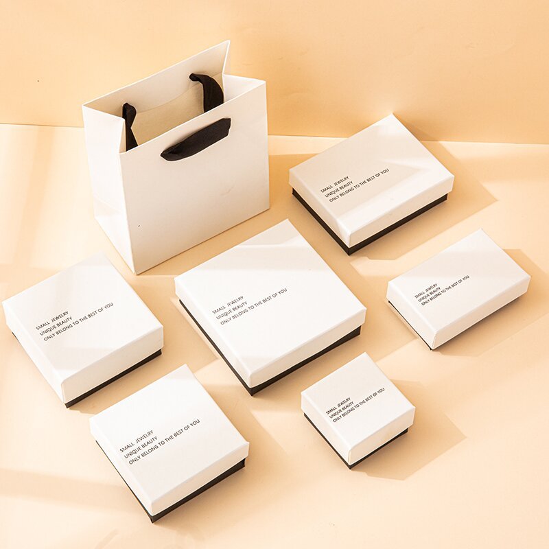 Fábrica en stock blanco negro caja de joyería luz lujo anillo pendientes caja de embalaje de la joyería