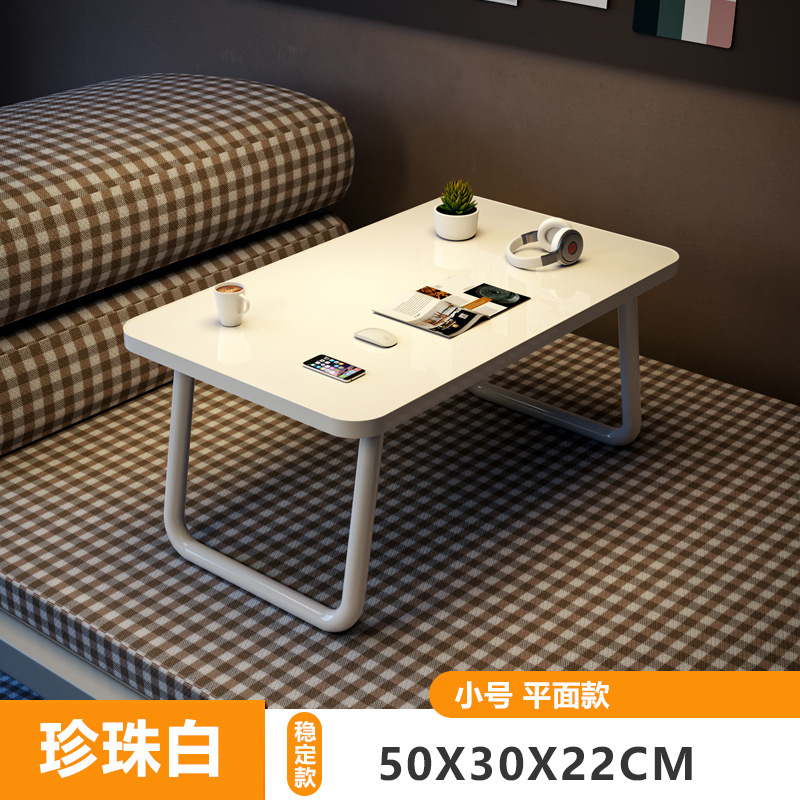 ノートパソコンの机の上で折り畳みます。|undefined
