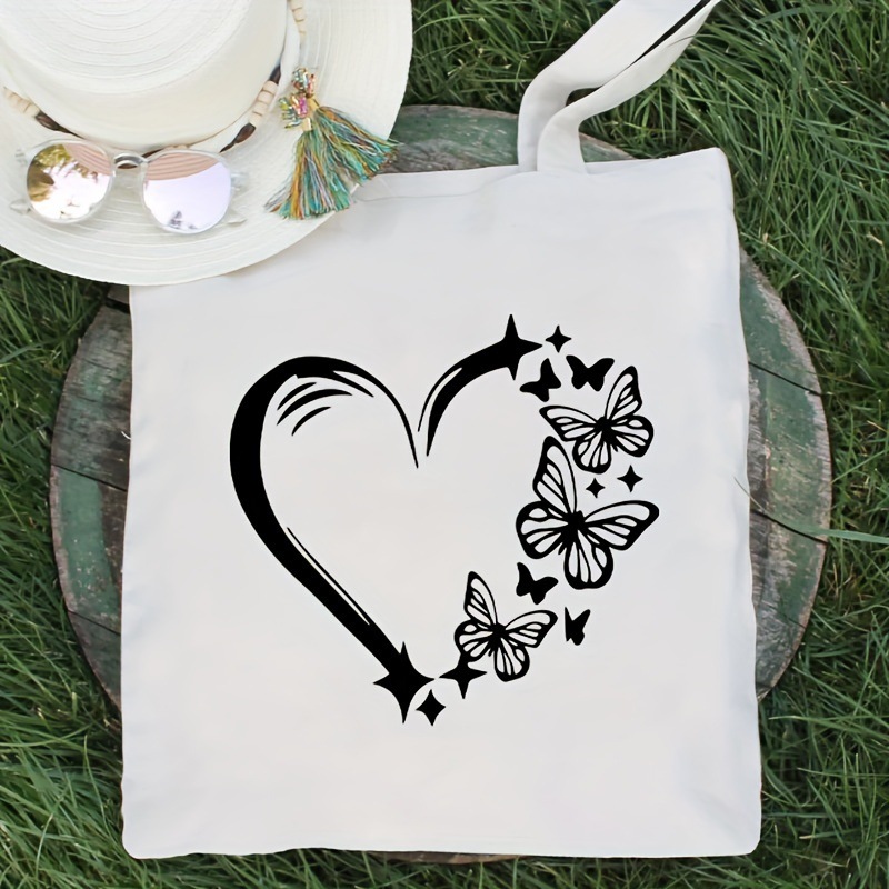 跨境热卖帆布手提袋带蝴蝶心形设计肩包重复使用购物和旅行信使包