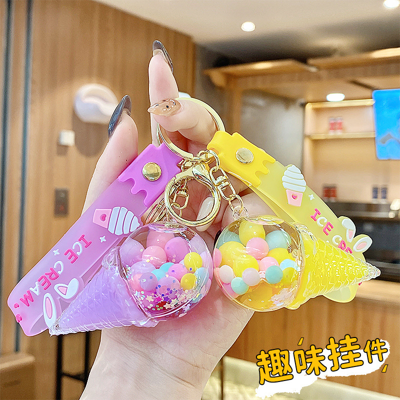 Arenas flotantes transfronterizas coloridas frijoles botellas flotantes de helado llaveras de chicas bolsos colgantes de arena flotante pequeña decoración colgante para mujeres
