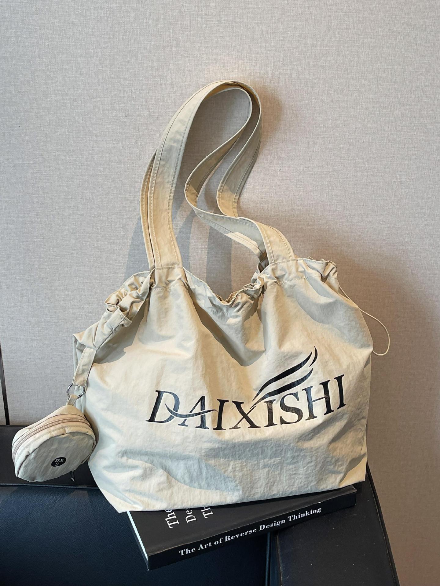 Bolso de estilo perezoso para mujer de gran capacidad 2025 nuevo bolso de lona coreano bolso de mujer de viaje ligero de ocio