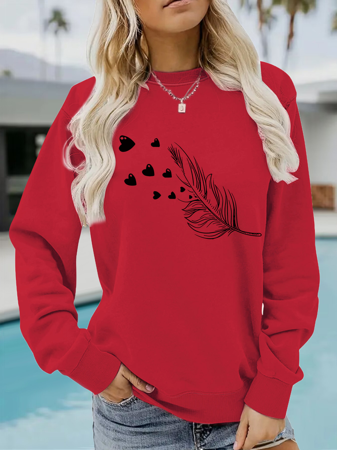 Europe and the United States cross-border autumn and winter women's casual long sleeve round neck feather printing pullover sweatshirt sweater wholesale