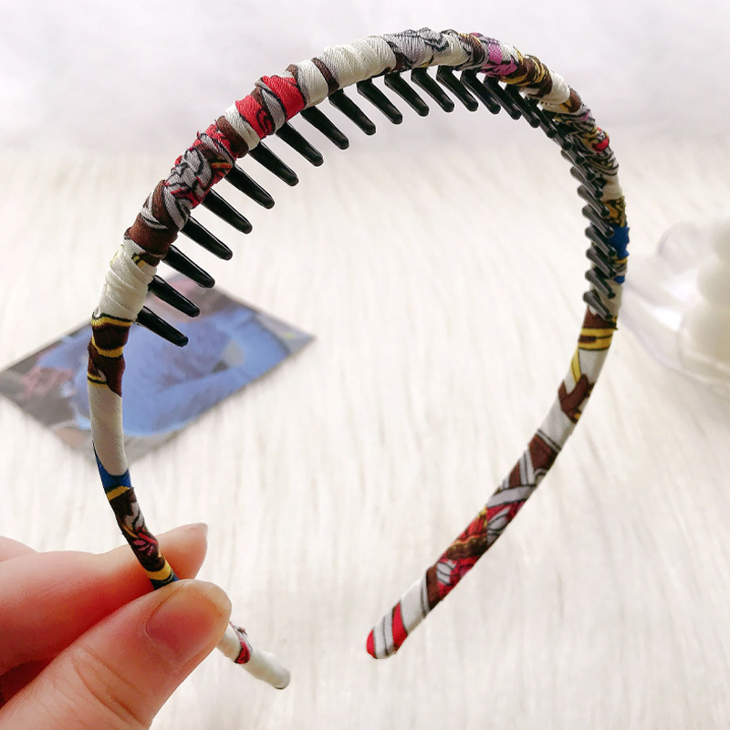 Banda de pelo de estilo coreano al por mayor Peine del pelo accesorios para el cabello lavado de la cara presionando diadema dentada antideslizante horquilla elegante dulce Internet celebridad banda de pelo