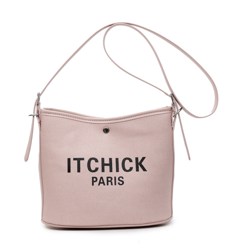 Transfronterizos de gran capacidad bolso de cubo portátil de tela de mujer impresión de letras de moda alta textura versátil mochila