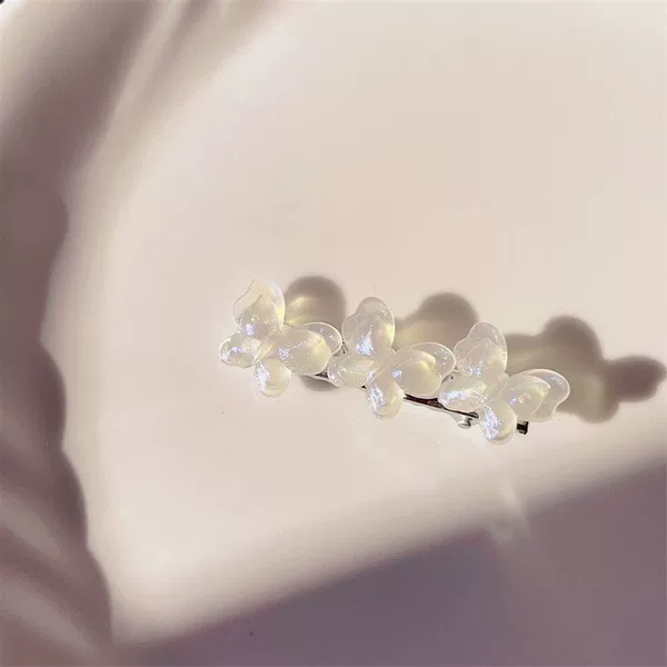1 white glitter three-butterfly duckbill clip