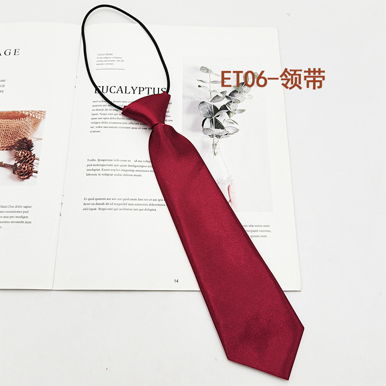 Spot de fábrica al por mayor conjunto de pajarita de corbata para niños de escuela primaria, corbata a rayas de color sólido, pajarita de raíz de plumas