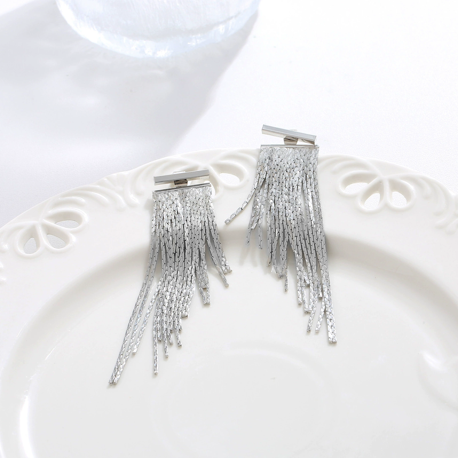 Earrings, bangs with tassels