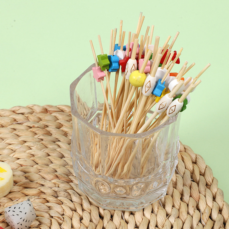 Signo de fruta desechable lindo florecita fresca bolita color postre sushi hamburguesa arte fruta palo de bambú al por mayor