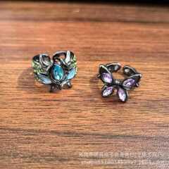 新型の越境小衆のデザイン感の暗い皮のバックルの紫のドリルの蝶の口の指輪の女性のファッションの個性の甘いクールな潮
