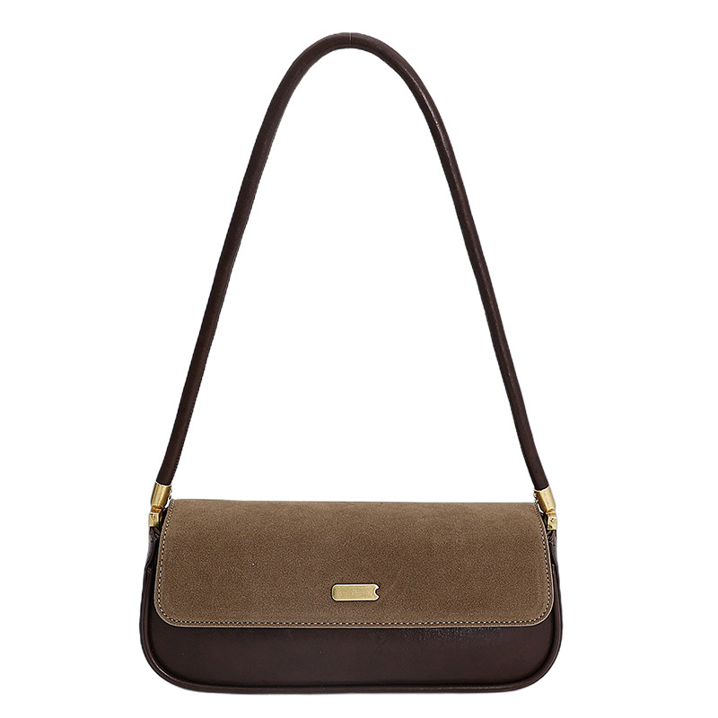 Bolsas de brazo retro de moda transfronteriza mujeres 2025 invierno nuevo estilo francés nicho bolsas de palo de moda bolsas de hombro casuales