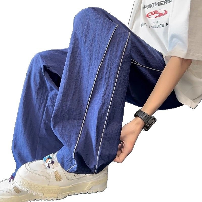 Pantalones blancos de línea clara para hombres de verano delgados pantalones deportivos de pierna ancha de marca de moda pantalones casuales de hombre rectos sueltos