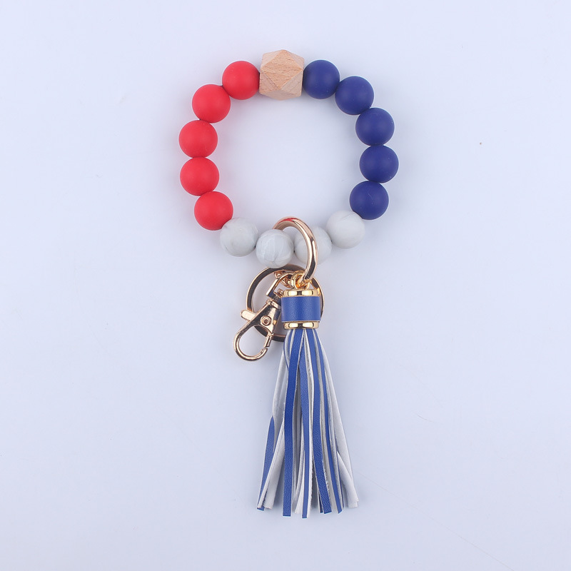 Nuevo cuero de LA PU corto Borla Llavero DIY de silicona de impresión de leopardo de color sólido con cuentas muñeca llavero colgante