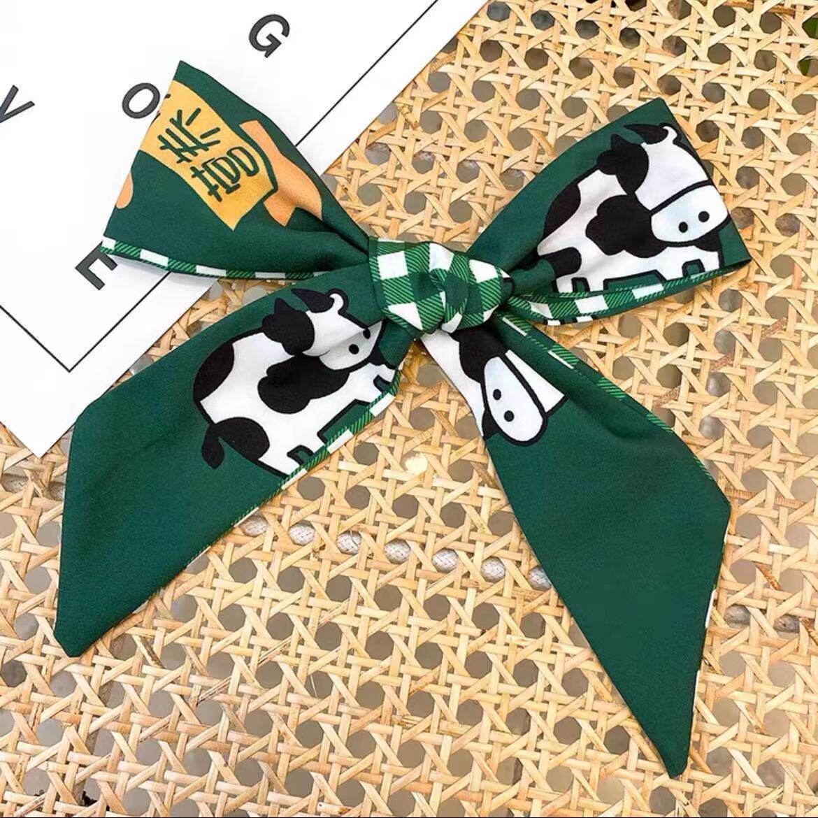Green series-white cow