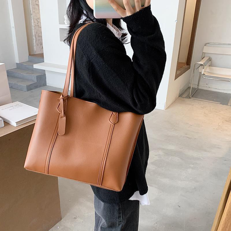 Bolsos de gran capacidad, bolsos de mujer, 2025, nuevos bolsos de ocio de celebridades de Internet de moda, simples, portátiles de un solo hombro