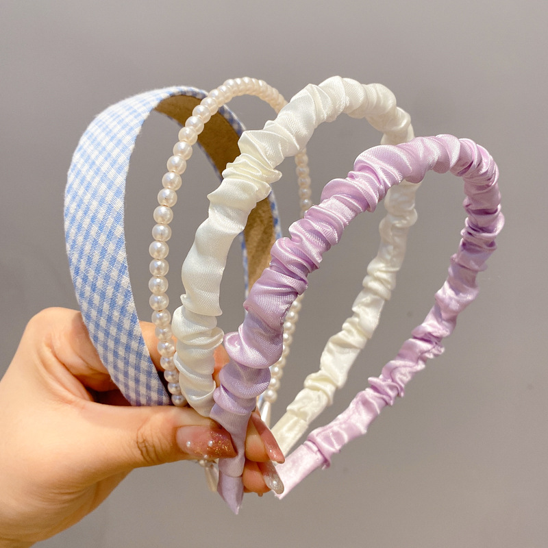 A principios de la primavera, la banda de cabello para mujeres en línea, 2025 nuevo lavado de cara de presión de tarjeta de cabello para el cabello, banda de cabello de perlas, banda de cabello para mujeres.