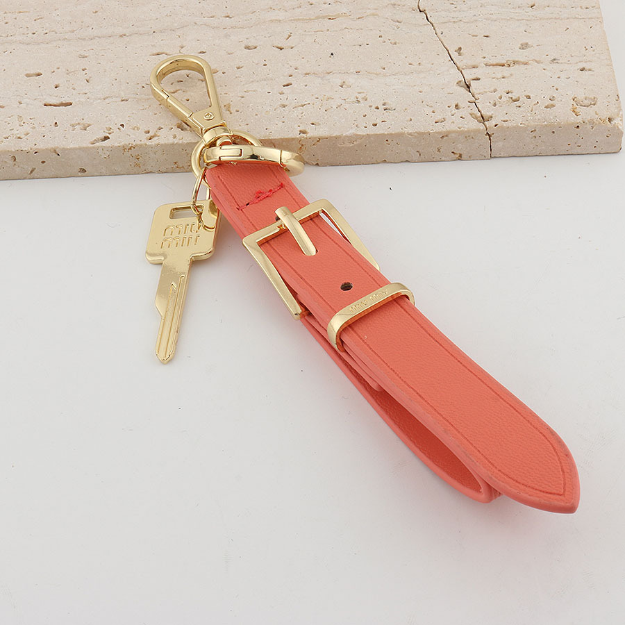 Xiaohongshu ins estilo explosivo uim caja de llaves de cuero colgante llavero de coche colgante pequeño de moda para hombres y mujeres