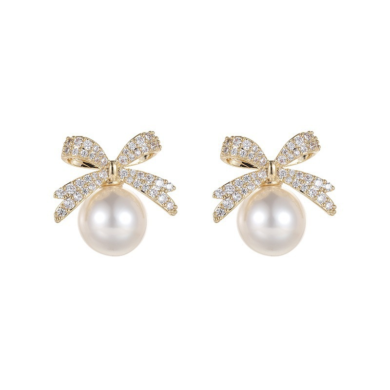 Korean bow pearl studded diamond temperament, niche, light luxury, high-end design, earring earrings_voghion.com