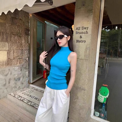 青い半高襟のノースリーブtシャツの女性の夏の弾力性のあるスリムなインナーニットのベストのギャルは痩せています。