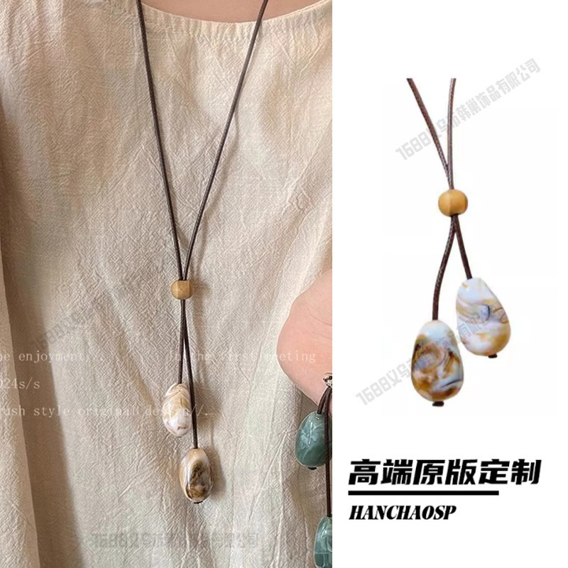 新しい中国風の禅ロングフェザーネックレスレトロエスニックスタイルセラミックセーターチェーンボヘミアンペンダントアクセサリー女性のための|undefined