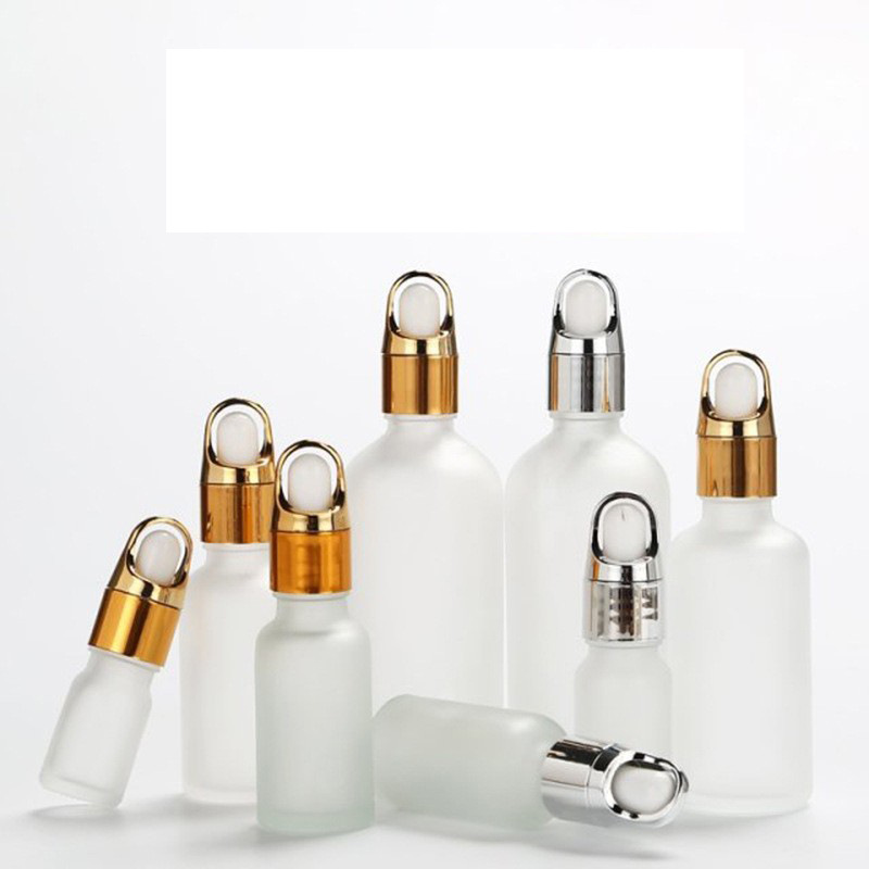 En stock botella cuentagotas de vidrio esmerilado transparente botella de aceite esencial cesta de flores cabeza de plástico cosmética sub-botella vacía