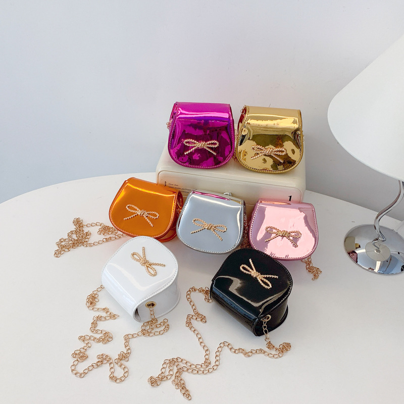 Nuevo bolso de cadena para niños lindo lazo bolso de mensajero para bebé simple color sólido láser brillante bolso de mensajero para niñas