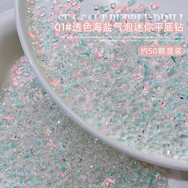 Popular en línea popular sal de mar burbuja arte de uñas diamante en forma especial tamaño pequeño color de fondo transparente Aurora mezclado joyería de uñas al por mayor