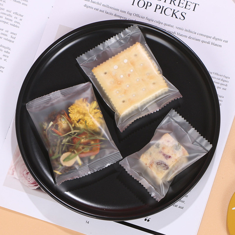 Bolsa de sellado de la máquina esmerilada translúcida gruesa bolsa de galletas crujientes de copo de nieve bolsa de embalaje de caramelo Bolsa De postre de té perfumado