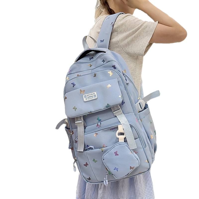Cute mochila de gran capacidad nueva mochila de estudiantes de viajes de secundaria y secundaria de alto valor de la cara mochila de hombro de estudiantes en venta caliente